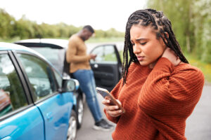 Woman on phone | accident recovery care | car accident | ProCare Chiropractic Center